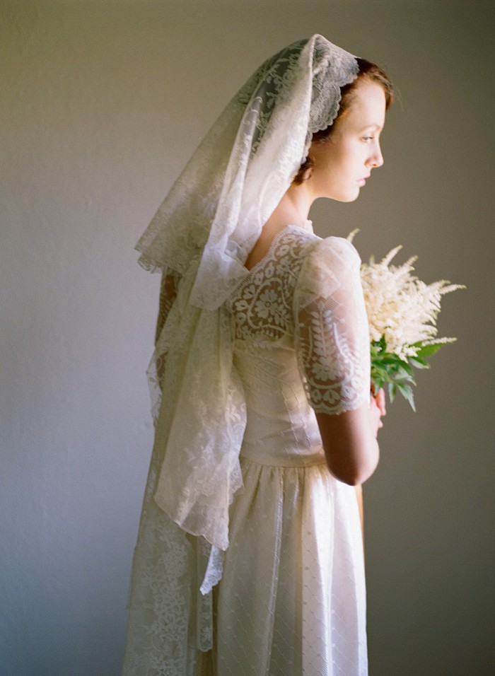 Retro bride getting ready and Astilbe bouquet.